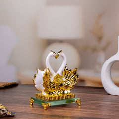 Sleek White and Golden Swan Statue