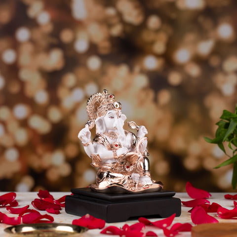 Ganesh Ji||Radiant Rose Gold Polercyin Showpiece: Elegance in Every Detail"